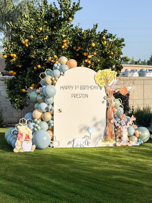 pooh themed balloon backdrop for parties | The Balloon Pop Co